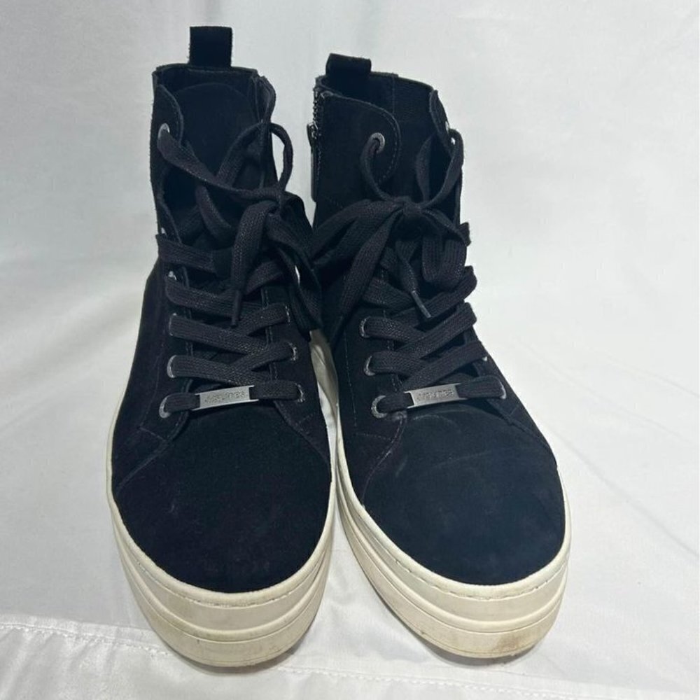 J/Slides woman’s black leather high tops with zipper and lace up options. Size 8